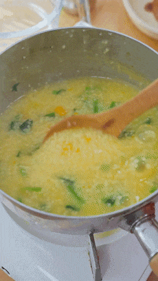 Step 7 for making Pumpkin Spinach Millet Porridge